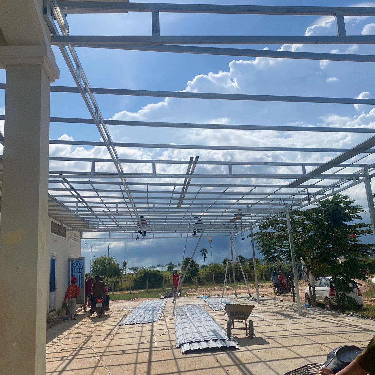 Steel roof frame of a new ministry building rising against the sky